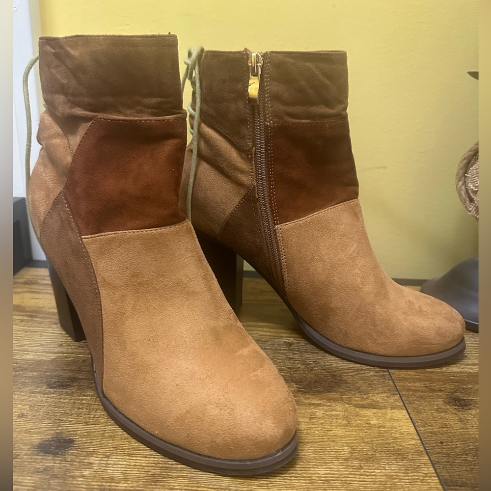 Meghan LA Tan and Brown Heeled Boots